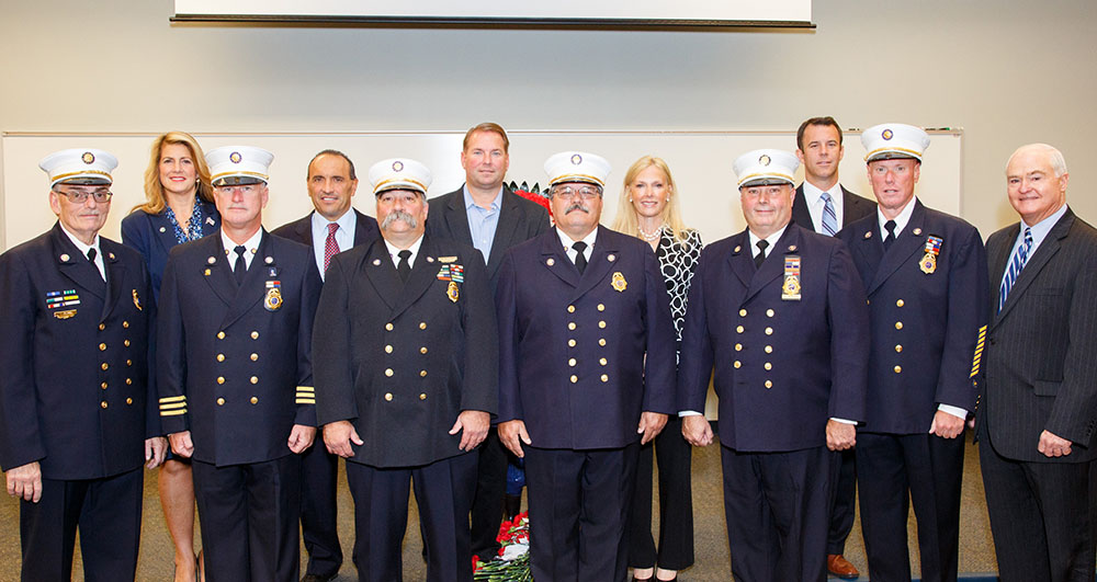 Pictured left to right: Back row: Freeholder Deputy Director Serena DiMaso, Freeholder Thomas A. Arnone, County Sheriff Shaun Golden,County Clerk Christine Giordano Hanlon and Acting Monmouth County Prosecutor Christopher J. Gramiccioni. Front row: Deputy Fire Marshal Vito Marra, 2nd  Deputy Fire Marshal Kevin Stout, 1st Deputy Fire Marshal Anthony Vecchio, County Fire Marshal Henry Stryker III, 3rd  Deputy Fire Marshal Richard Hogan, Deputy Fire Marshal Christopher Pujat and Freeholder John P. Curley.